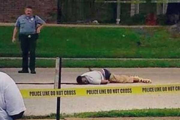 Michael Brown dead in the street in Ferguson, Missouri
